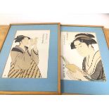 Two early 20thc Japanese prints of women reading with character marks and seals, measures 37cm x