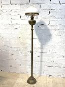 A Victorian brass floor standing telescopic gas lantern with opaline glass shade, H160cm