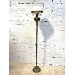 A Victorian brass floor standing telescopic gas lantern with opaline glass shade, H160cm