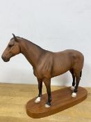 A Beswick horse figure inscribed Nijinsky Winner of the Triple Crown 1970 measures 28cm high