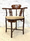 A Chinese rosewood corner chair, the crest rail with mother of pearl inlay, with squab cushion,
