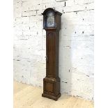 A 20th century oak cased Westminster chiming grandmother clock, the silvered dial with Roman chapter