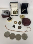 A mixed lot including silver medals, pendants, a gilt silver necklace, two green stone Chinese