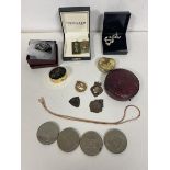 A mixed lot including silver medals, pendants, a gilt silver necklace, two green stone Chinese