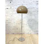 A mid century Guzzini style standard lamp, circa 1960 - 1970, with a mushroom shade, on a chrome