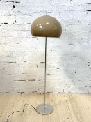 A mid century Guzzini style standard lamp, circa 1960 - 1970, with a mushroom shade, on a chrome