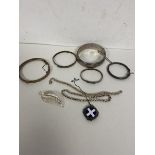 A mixed lot of silver including four bangles, largest measures 6x1.5cm, two rope twist silver
