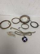 A mixed lot of silver including four bangles, largest measures 6x1.5cm, two rope twist silver