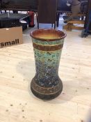 A late 19thc floor vase of tulip form with foliate decoration stamps to interior rim measures 60cm