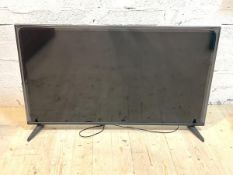 A Sharp 47" flatscreen TV, no remote