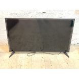 A Sharp 47" flatscreen TV, no remote