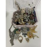 A quantity of costume jewellery including brooches, earrings, pendants, necklaces etc (a lot)