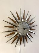 A Vintage Metamic sunburst wall clock with quartz movement, D61cm