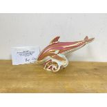 A limited edition Royal Crown Derby pink dolphin with gold stopper includes card stating number