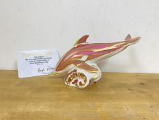 A limited edition Royal Crown Derby pink dolphin with gold stopper includes card stating number