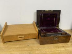 A Victorian walnut veneered writing slope with fitted interior measures 14x30x22cm along with a