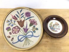 Two 1930's embroidered panels one oval with floral spray which measures 29.5cm x 24cm, the other