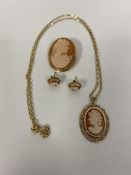 A shell cameo in a 9ct gold mount and on a 9ct gold chain along with 9ct gold stud earrings and