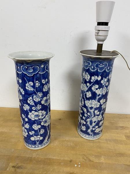 A blue and white Chinese spill vase with punus decoration later converted to a lamp and another