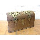 An unusual late Victorian stationery casket with domed top and pierced brass binding, possibly