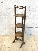 A stained beech three tier folding cake stand, H93cm