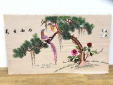 A Chinese silk embroidered panel depicting birds in a tree, characters to top left, measures 46cm