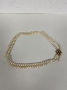 A two strand cultured pearl necklace with 9ct gold clasp with cluster of pearls measures 20cm