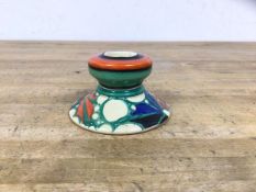 A Clarice Cliff Fantasque pattern candlestick with conical base measures 5cm high