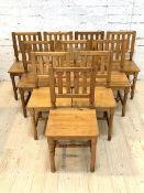 John Lewis of Hungerford, A set of ten pitch pine farmhouse style dining chairs, the rail backs over