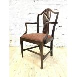 A 19th century mahogany carver dining chair, with pierced splat back, open arms, raised on square