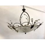 An anodised metal ceiling pendent light fitting with four branches and glass shade, D60cm