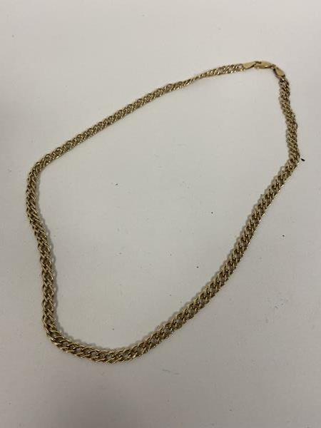A 9ct gold fancy link necklace measures 22cm and weighs 6.58 grammes