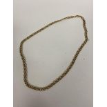 A 9ct gold fancy link necklace measures 22cm and weighs 6.58 grammes