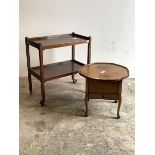 A mid 20th century mahogany two tier drinks trolley on castors, (H76cm, W69cm, D39cm) together