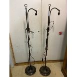 A pair of Edwardian adjustable polished metal reading floor lamps on a dishes base, measure 150cm