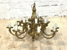 A Large cast brass sixteen branch chandelier, with ceiling rose, D81cm