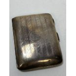 A 1920's Birmingham silver cigarette case, weighs 58 grammes