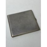 A 1920's / 30's London silver cigarette case, makers mark GBs, measures 10cm x 9cm and weighs 184