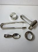 A quantity of silver including Georgian pair of Scottish sugar nips, hallmarks include a thistle,