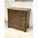 An Edwardian mahogany bow front chest, fitted with two short and three long graduated drawers,