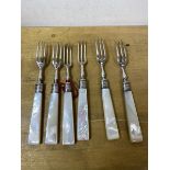 A set of six 1919 forks with mother of pearl handles and Sheffield silver tines and collars, each