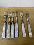 A set of six 1919 forks with mother of pearl handles and Sheffield silver tines and collars, each