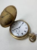 A late 19th early 20thc full hunter pocket watch, face inscribed The Angus, yellow metal case