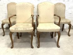A Set of six (4+2) early 20th century Queen Anne style walnut dining chairs, upholstered in ivory