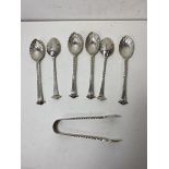 A set of six 1892 London silver onslow pattern coffee spoons with shell bowls and spiral twist