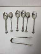 A set of six 1892 London silver onslow pattern coffee spoons with shell bowls and spiral twist