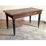 A Victorian mahogany table, the rectangular top over plain frieze and turned supports terminating in