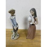 Two Lladro figures, one of a girl with spectacles and books and flowers, the other holding a hat,