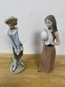 Two Lladro figures, one of a girl with spectacles and books and flowers, the other holding a hat,