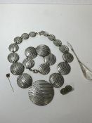 A 15 ct gold stick pin with horse shoe and crop finial, weighs 1.09 grammes, also a 1970's style